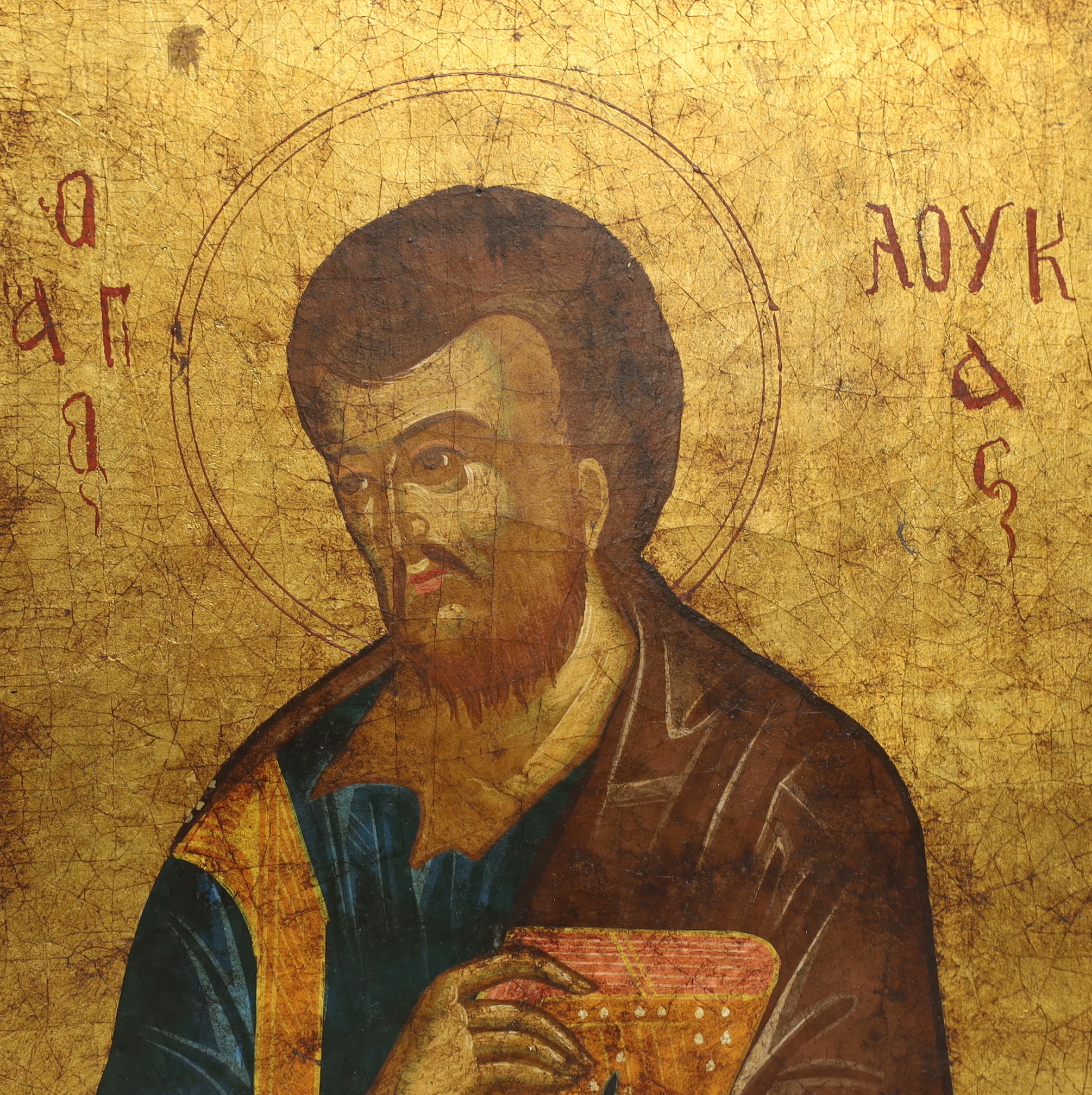 A 19th century Russian Icon, Luke the Evangelist, 23cm wide x 29cm high